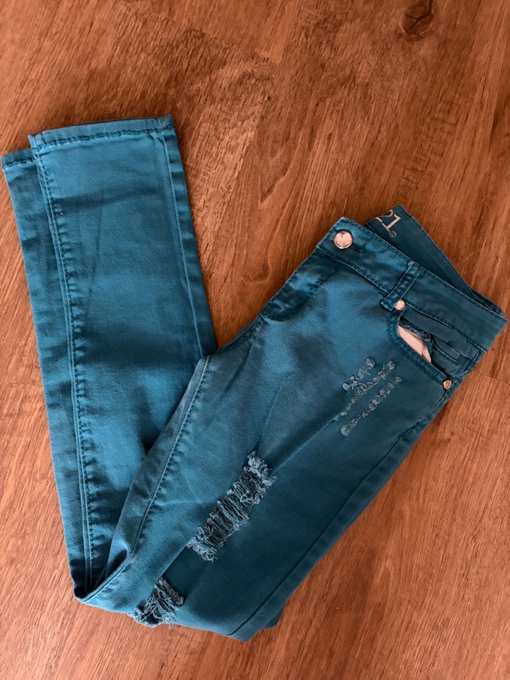 Teal Ripped Sinnky Jeans